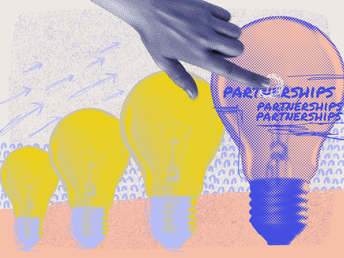 Three colourful graphic lightbulbs with a hand pointing at the word partnerships overlayed on the biggest lightbulbs